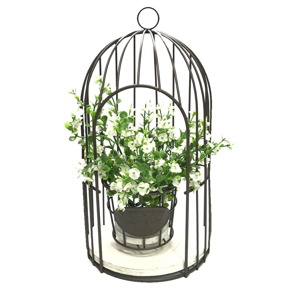 Cage d'oiseaux avec décoration de fleurs